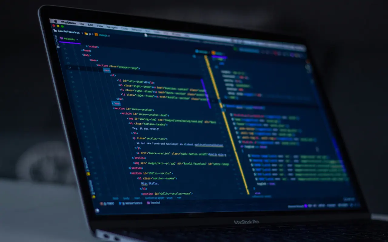 Developer workstation with code on multiple monitors
